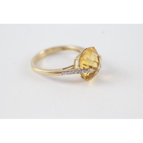 57 - 9ct gold faceted citrine & diamond dress ring (2.5g) Size  L