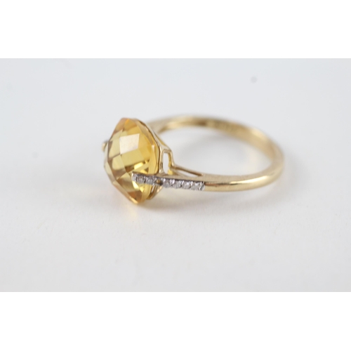 57 - 9ct gold faceted citrine & diamond dress ring (2.5g) Size  L