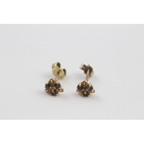 59 - 9ct gold sapphire stud earrings with scroll backs (0.6g)