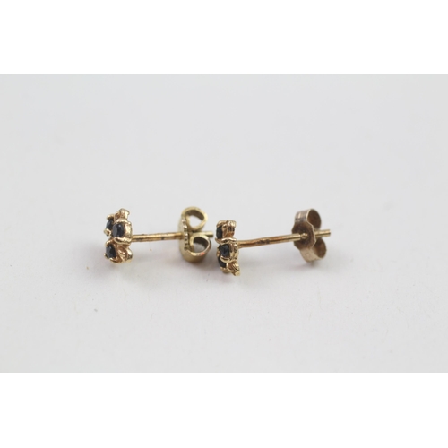 59 - 9ct gold sapphire stud earrings with scroll backs (0.6g)