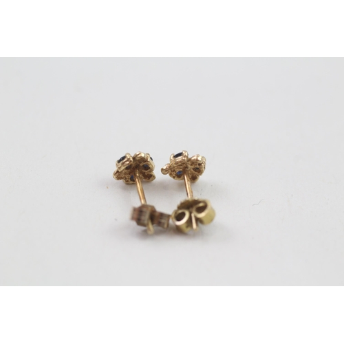 59 - 9ct gold sapphire stud earrings with scroll backs (0.6g)