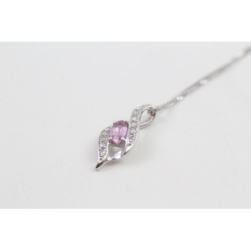 66 - 9ct gold oval cut pink sapphire & diamond pendant necklace (1.5g)