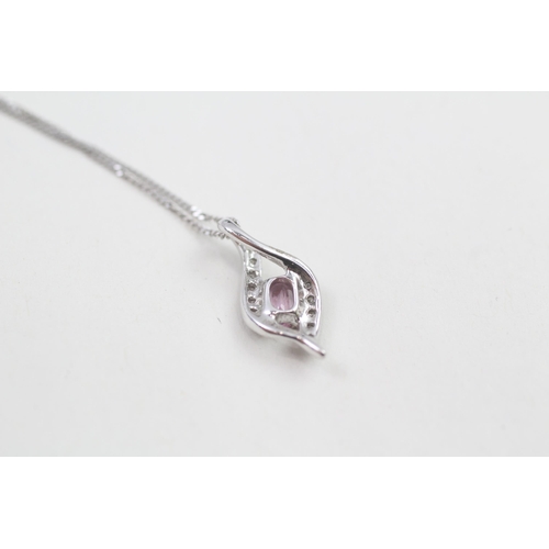 66 - 9ct gold oval cut pink sapphire & diamond pendant necklace (1.5g)