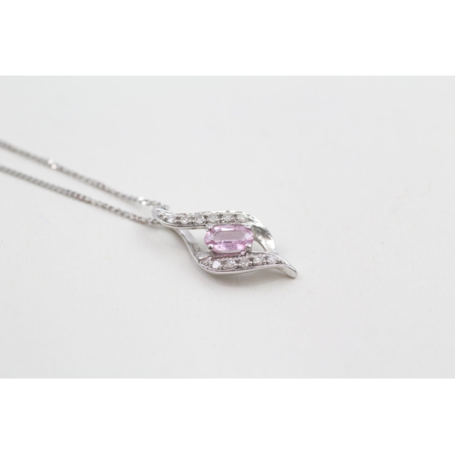 66 - 9ct gold oval cut pink sapphire & diamond pendant necklace (1.5g)