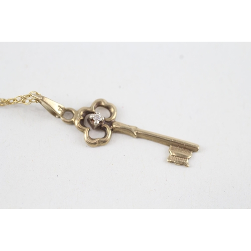 67 - 9ct gold diamond key pendant necklace (1.4g)