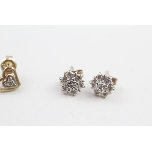 76 - 2 x 9ct gold diamond stud earrings (2.1g)