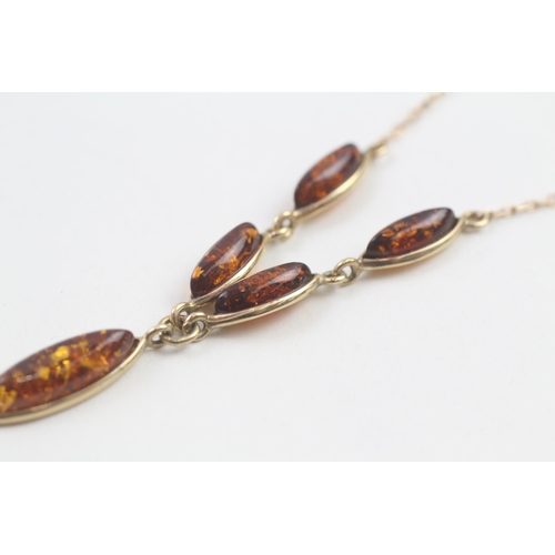 78 - 14ct gold amber drop necklace (4.3g)