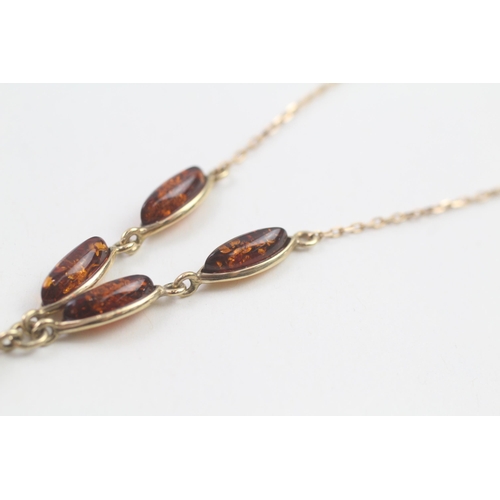 78 - 14ct gold amber drop necklace (4.3g)