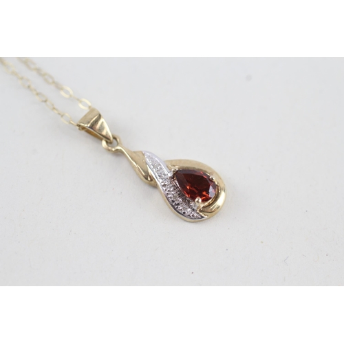 97 - 9ct gold pear cut garnet & diamond pendant necklace (1.3g)