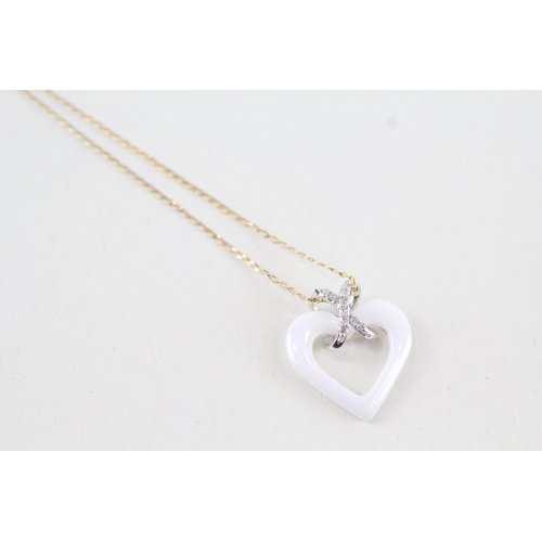 98 - 9ct gold diamond heart shaped pendant necklace (1.7g)