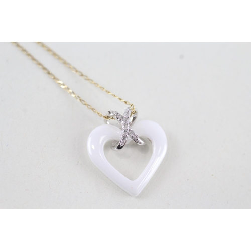 98 - 9ct gold diamond heart shaped pendant necklace (1.7g)