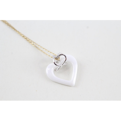 98 - 9ct gold diamond heart shaped pendant necklace (1.7g)