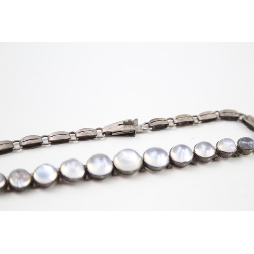 330 - Silver antique graduated Moonstone bracelet (7g)