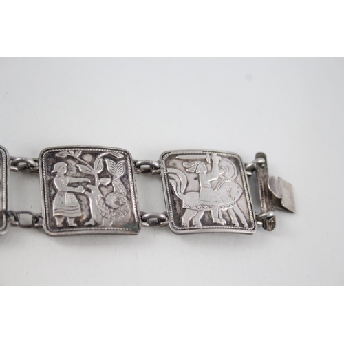 334 - A collection of silver Scandi jewellery including story teller bracelet (56g)