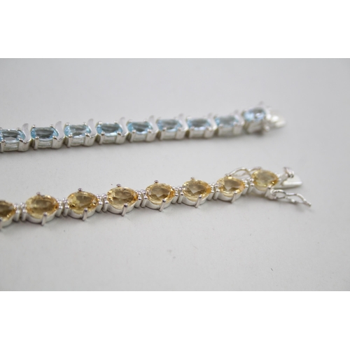 339 - Two silver gemstone tennis bracelets including Citrine (31g)