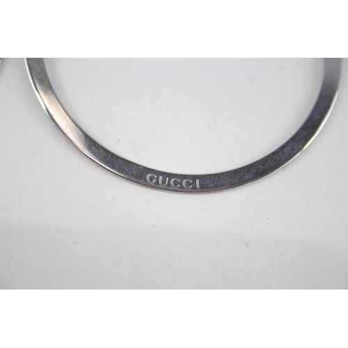 340 - Pair of silver hoop earrings by designer Gucci (15g)