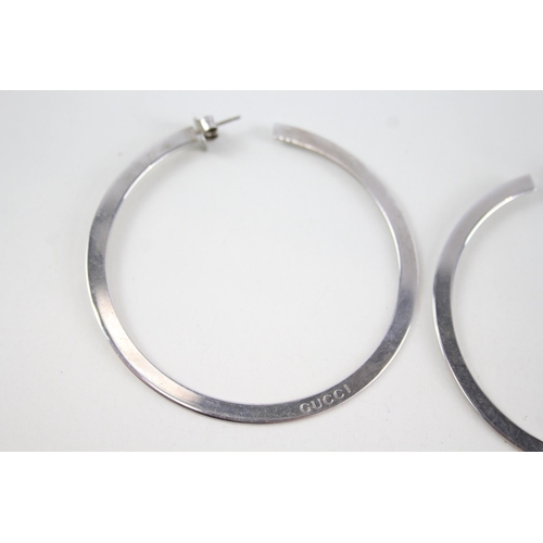 340 - Pair of silver hoop earrings by designer Gucci (15g)