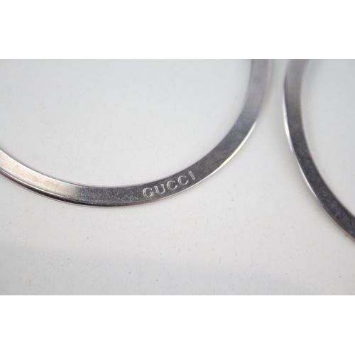 340 - Pair of silver hoop earrings by designer Gucci (15g)