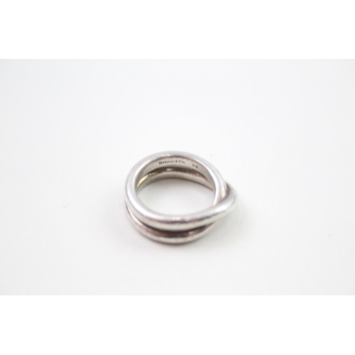 349 - Silver crossover ring by designer Tiffany & Co (9g)
Size L