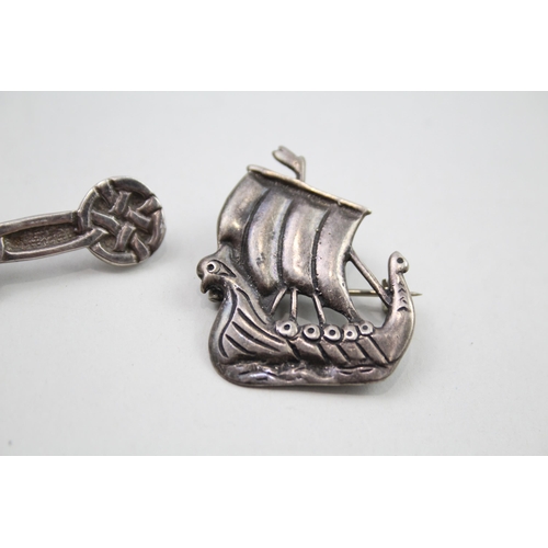 352 - Two silver Scottish Viking boat brooches including Iona (17g)