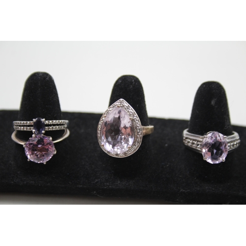 365 - A collection of silver Amethyst rings including TGGC (23g)