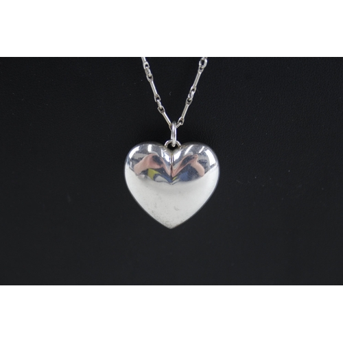 386 - Silver puffed heart pendant necklace by designer Tiffany & Co (11g)