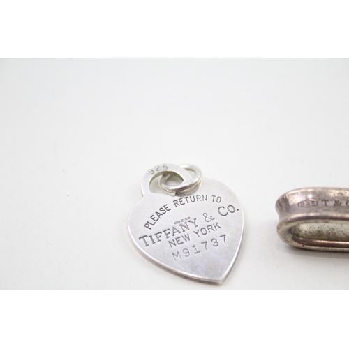 387 - Two silver pendants by designer Tiffany & Co (18g)