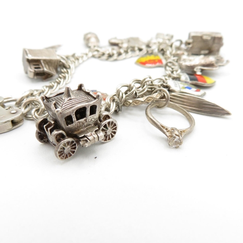 367 - HM silver charm bracelet  with assorted charms, some articulated  40.3g