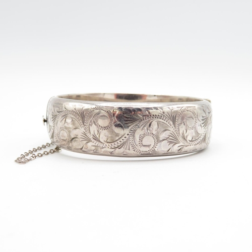 376 - HM silver bangle with safety chain intact  28g