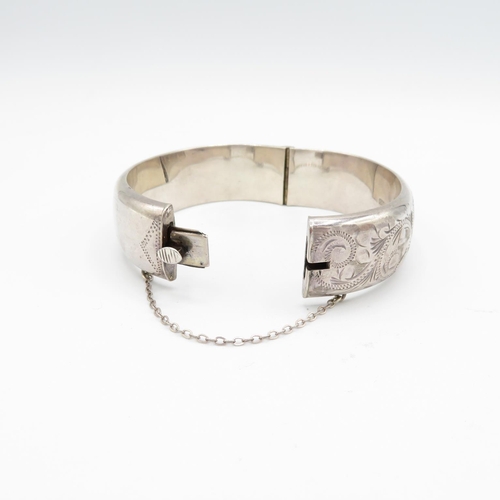 376 - HM silver bangle with safety chain intact  28g