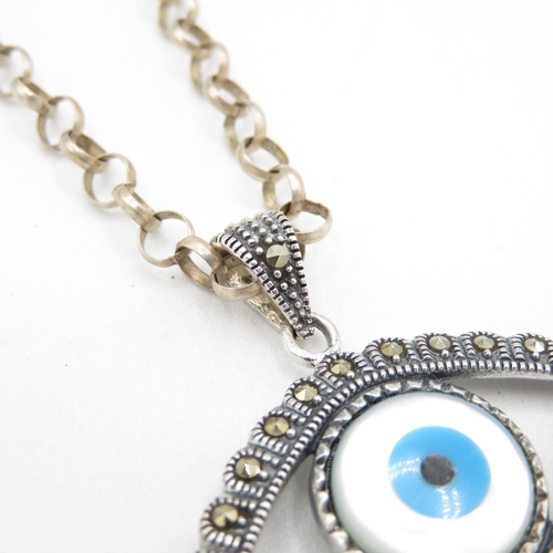 382 - HM silver evil eye pendant on 72cm long chain  13.9g