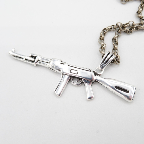 383 - HM silver AK47 rifle charm on 60cm long chain  22.5g