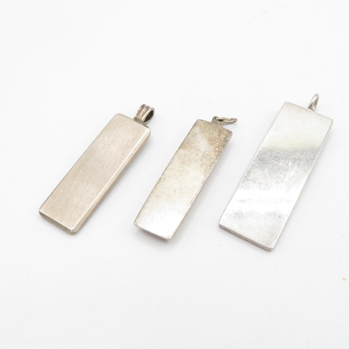 392 - 3x silver HM ingot pendants  47.5 total weight