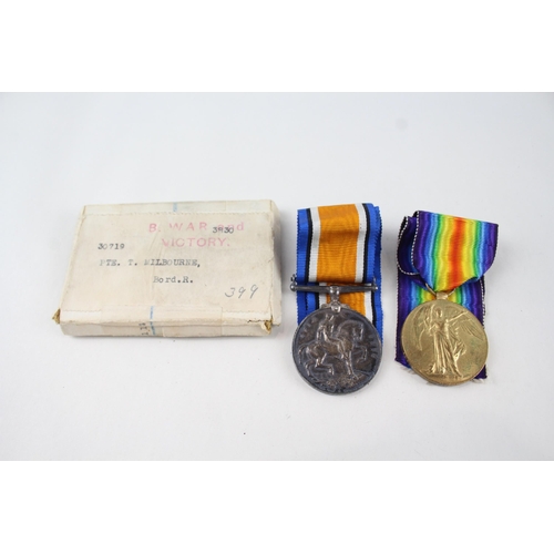 455 - Boxed WW II Medal Pair. Named. 30719 PTE. T. Milbourne. Bord. R.