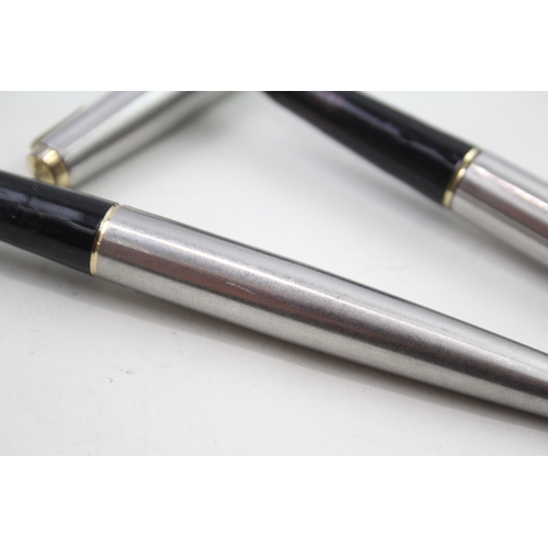 584 - 2 x Vintage PARKER 65 Brushed Steel Fountain Pens w/ 14ct Gold Nib WRITING