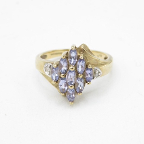 13 - 9ct gold marquise cut tanzanite & diamond dress ring (2.4g) Size  K