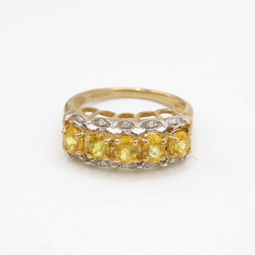 51 - 9ct gold yellow gemstone & diamond half eternity ring (2.3g) Size  J