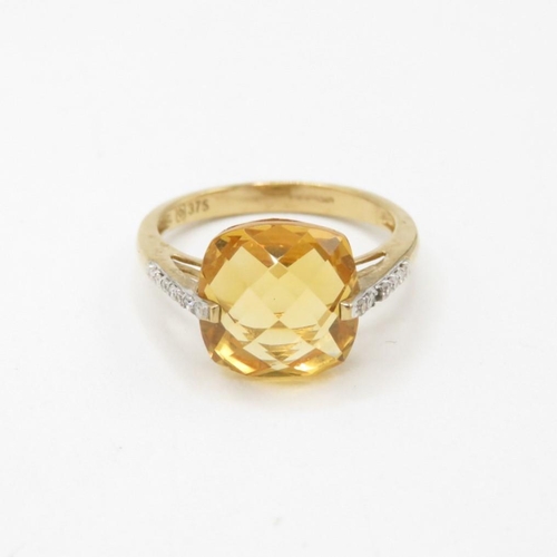 57 - 9ct gold faceted citrine & diamond dress ring (2.5g) Size  L