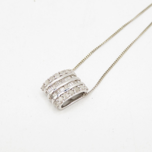 72 - 9ct white gold vari-cut diamond pendant necklace (2.3g)