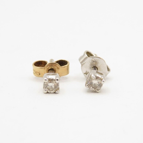 126 - 9ct gold diamond stud earrings with scroll backs (0.9g)