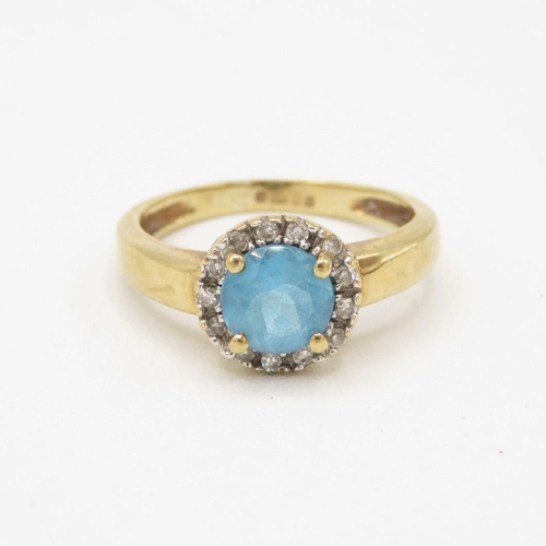 127 - 9ct gold blue topaz & diamond halo ring, claw set (2.1g) Size  J