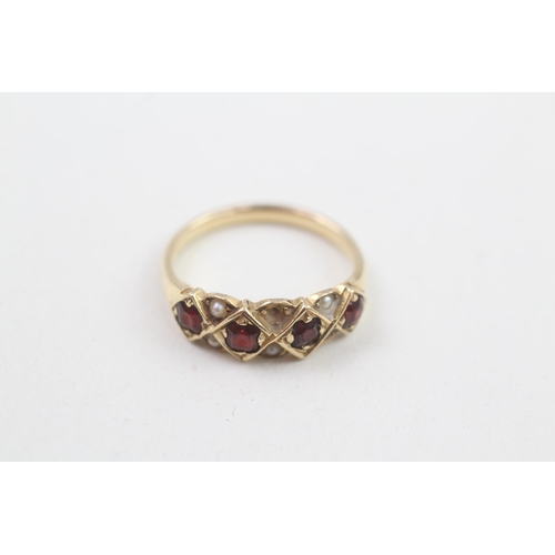 106 - 18ct gold garnet & seed pearl dress ring with missing stone 3g Size L