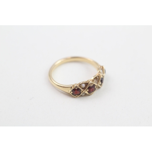 106 - 18ct gold garnet & seed pearl dress ring with missing stone 3g Size L