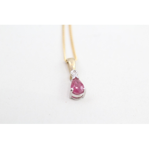 107 - 9ct gold diamond & pear shaped ruby pendant necklace 2.3g