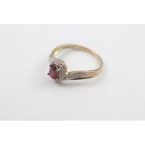 127 - 9ct gold diamond & red gemstone dress ring 1.8g Size M 1/2