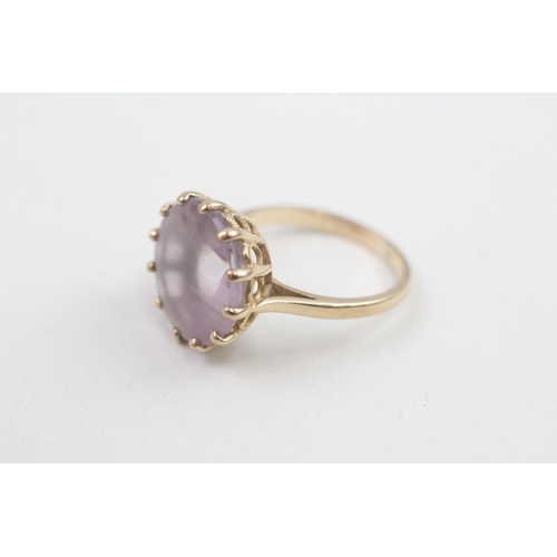 129 - 9ct gold amethyst single stone cocktail ring 4.5g Size O