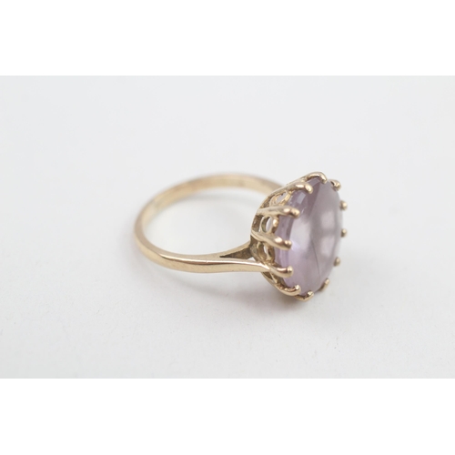 129 - 9ct gold amethyst single stone cocktail ring 4.5g Size O