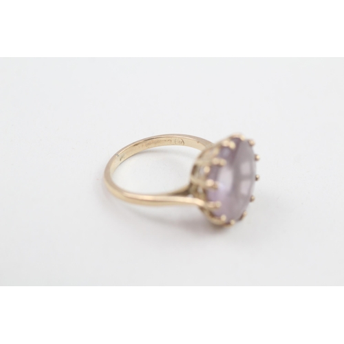 129 - 9ct gold amethyst single stone cocktail ring 4.5g Size O