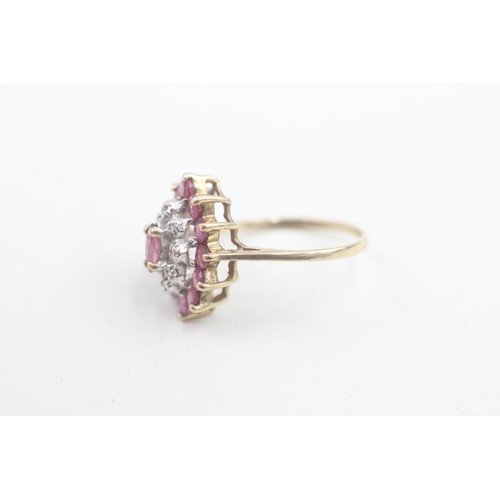 136 - 9ct gold diamond & ruby cluster ring 2.1g Size J