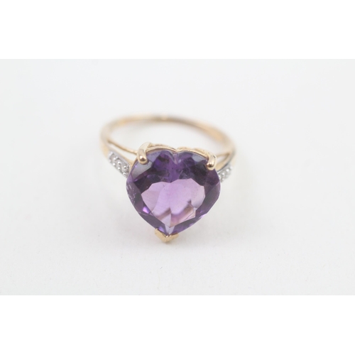 140 - 9ct gold amethyst heart ring with white gemstone set shoulders 3.3g Size N 1/2